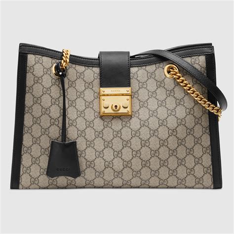 carol diva gucci|GG Supreme Canvas Padlock Medium Shoulder Bag .